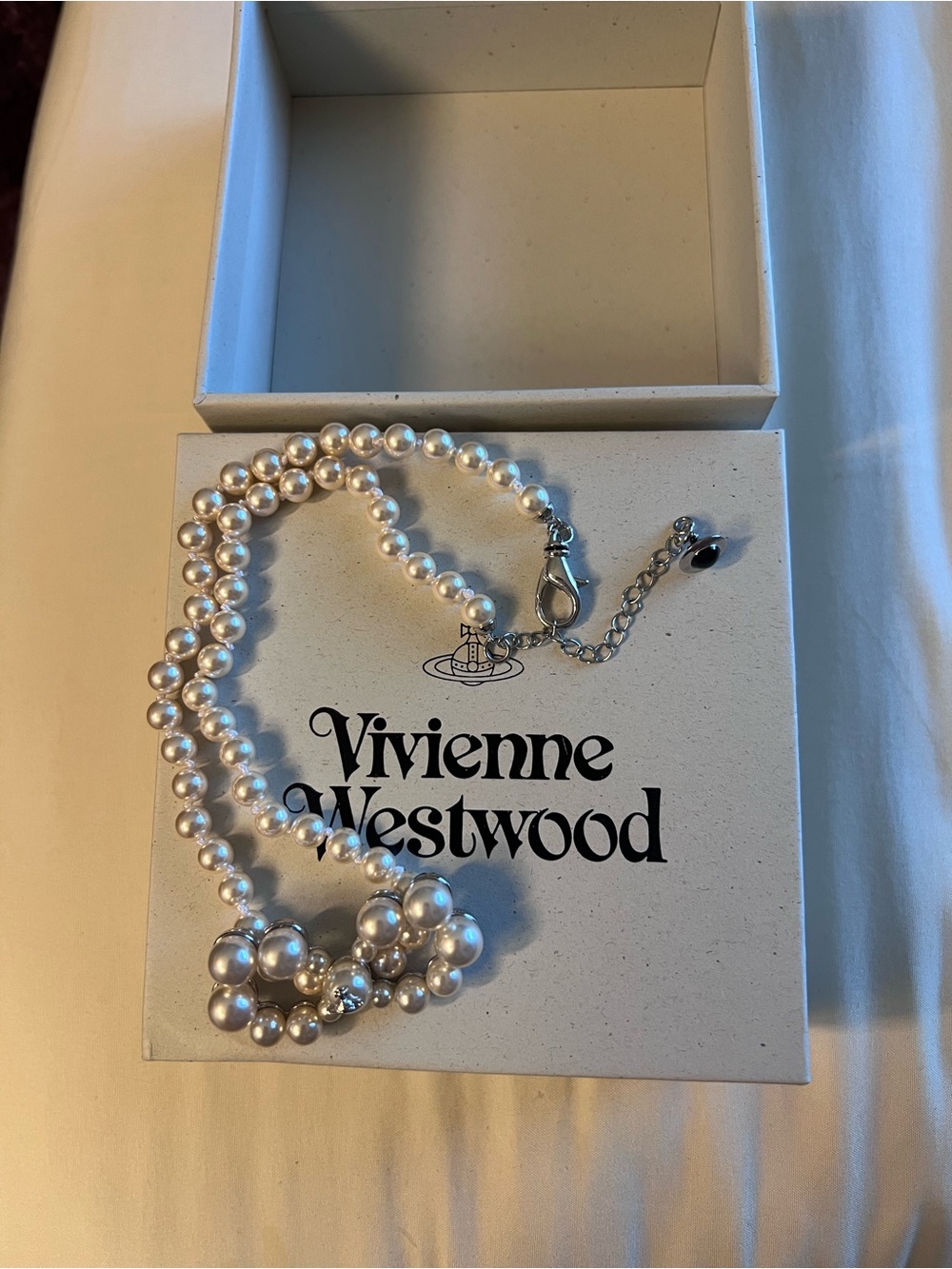 Vivienne Westwood Ivory Pearl Cluster Bow Necklace with Silver Accents